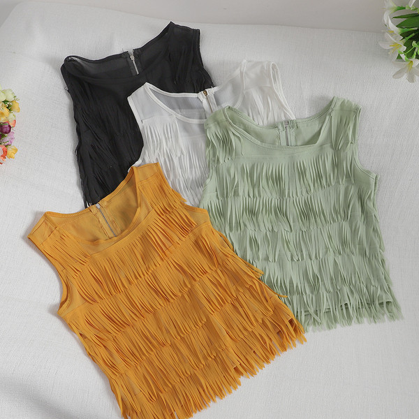 Modern női felső, széles pántokkal és rojtokkal több színben