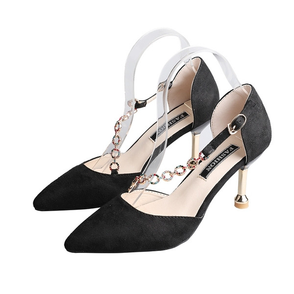 Elegáns női magas sarkú cipő bézs és fekete színben, díszítő kövekkel