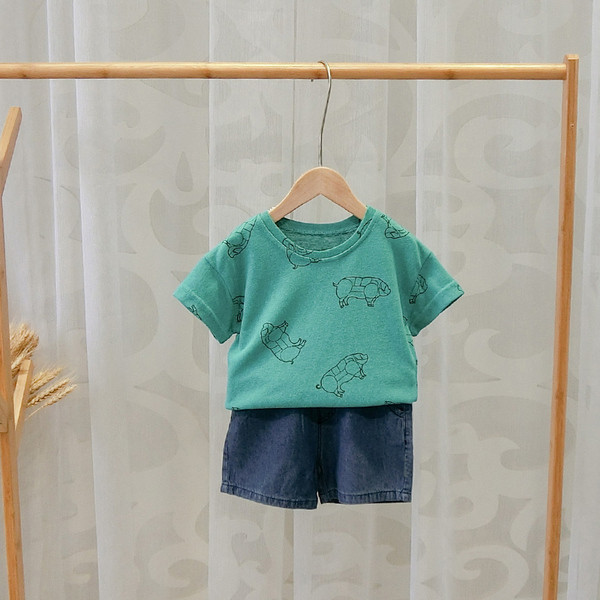 Zöld színű, O-nyakú gyerekpóló fiúknak