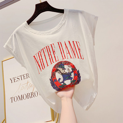 Modern női póló rátéttel és rövid ujjal