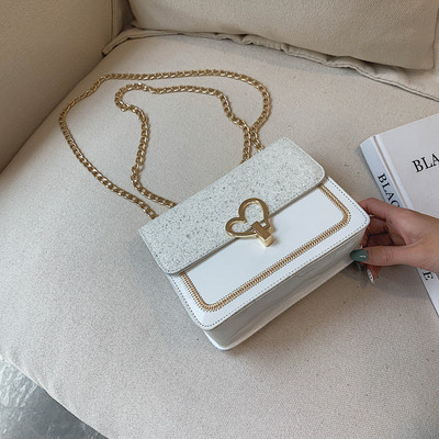 Geanta mica de dama cu maner lung si decor metalic in mai multe culori