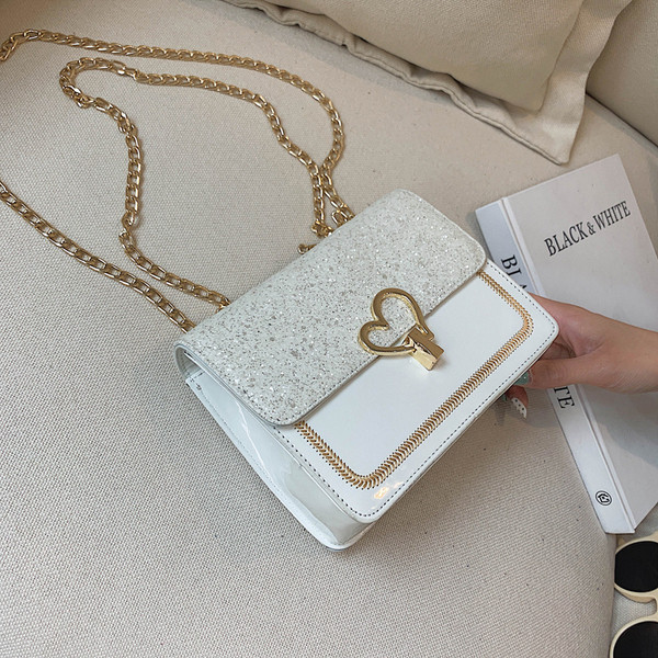 Geanta mica de dama cu maner lung si decor metalic in mai multe culori