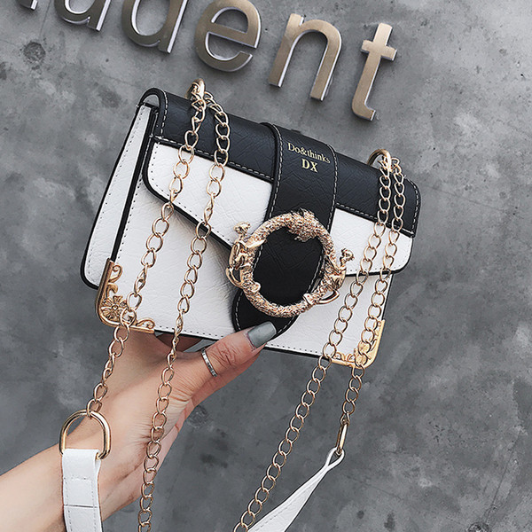 Eko bőrből készült alkalmi női táska, fekete-fehér fém elemekkel