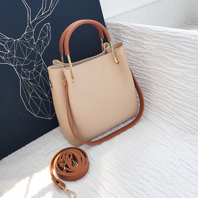 Eko bőrből készült alkalmi női táska rövid és hosszú füllel, több színben