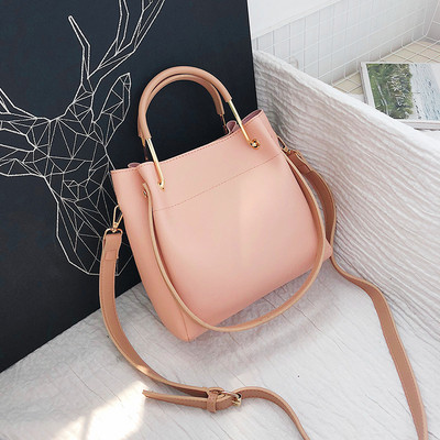 Eko bőrből készült alkalmi női táska rövid és hosszú füllel, több színben