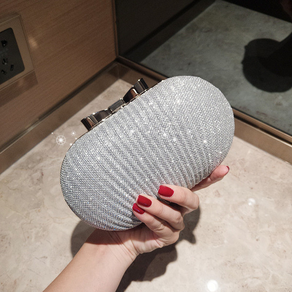 Elegáns női kulcs fényes hatással arany és ezüst színben