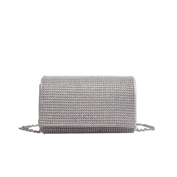 Elegáns női táska kövekkel fekete, ezüst és arany színben