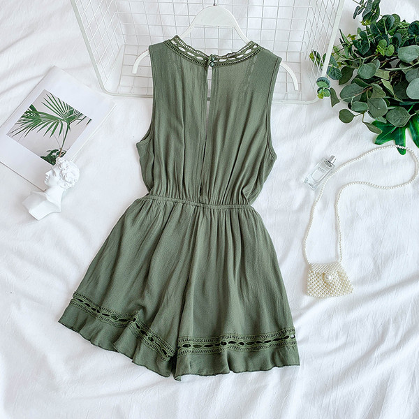 Alkalmi női overál mély nyakkivágással és megkötővel két színben