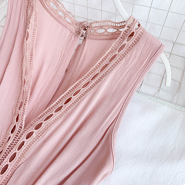 Alkalmi női overál mély nyakkivágással és megkötővel két színben