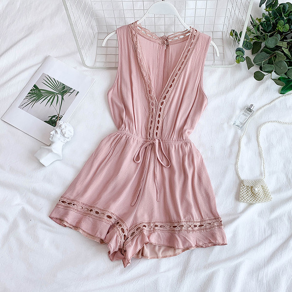 Alkalmi női overál mély nyakkivágással és megkötővel két színben