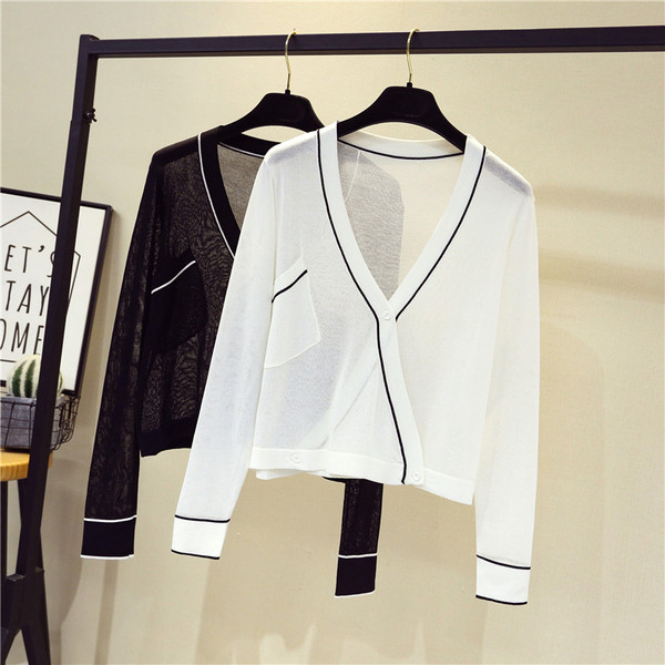 Vékony női mellény fehér és fekete színben