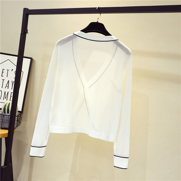 Vékony női mellény fehér és fekete színben