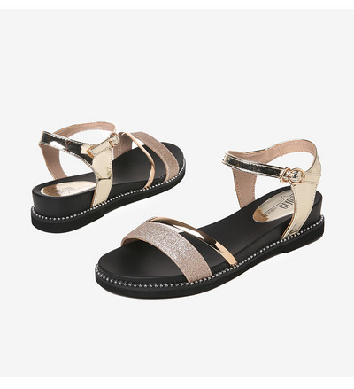 Női szandál arany és fekete színben