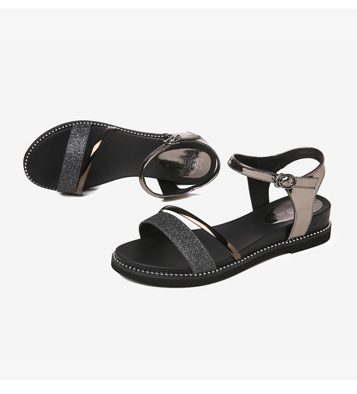 Női szandál arany és fekete színben