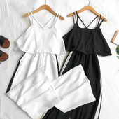 Stílusos női overall fehér és fekete pántokkal