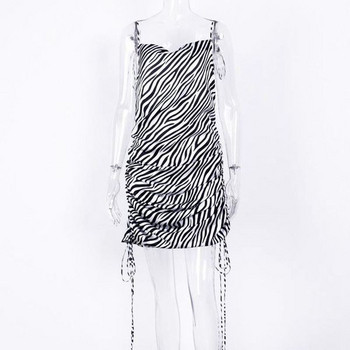 Modern női ruha nyakkendővel, csupasz háttal