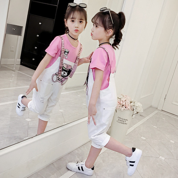 Modern gyerek szett lányoknak rózsaszín pólóval és fehér kombinékkal