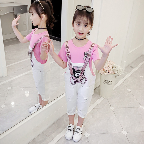 Modern gyerek szett lányoknak rózsaszín pólóval és fehér kombinékkal