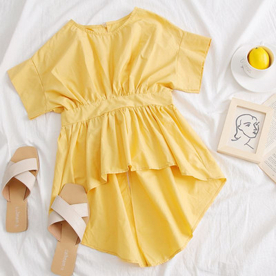 Modern női blúz aszimmetrikus modell O-nyakkal