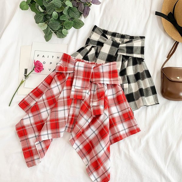 Fusta dama in carouri model asimetric cu cravate in mai multe culori