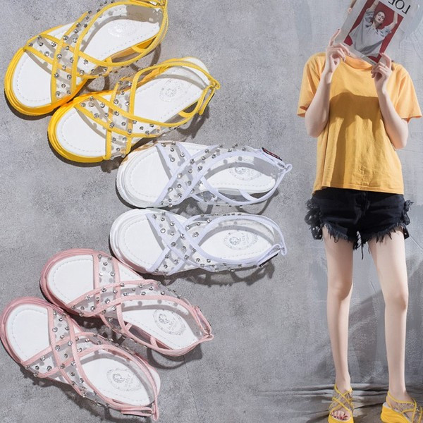 Alkalmi női szandál sárga, fehér és rózsaszín kövekkel