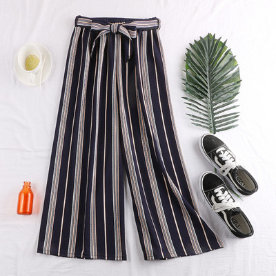 Pantaloni de damă în dungi cu element de legătură