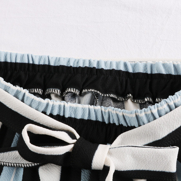 Pantaloni de damă în dungi cu element de legătură