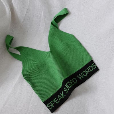 Több színben hímzéssel ellátott rövid női felső