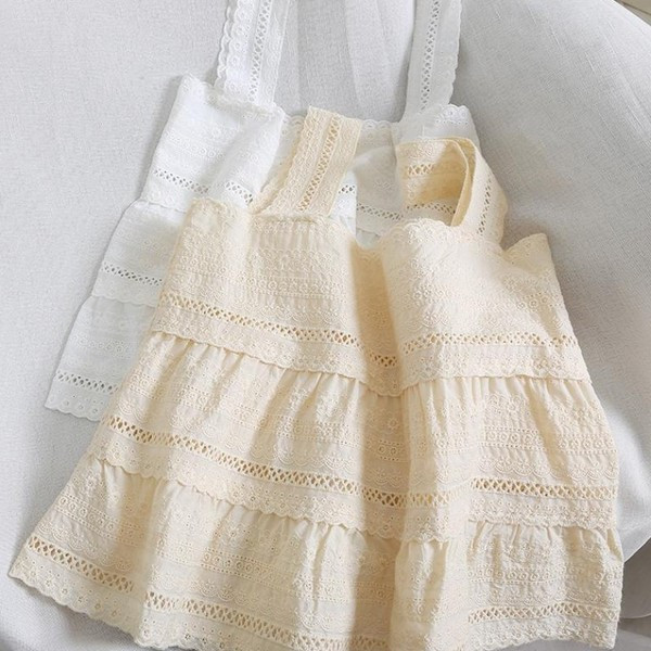 Modern női felső, vastag pántokkal, fehér és bézs színben