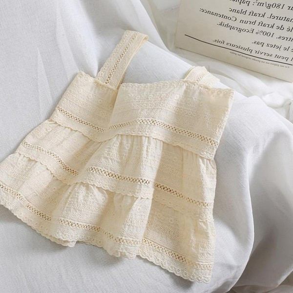 Modern női felső, vastag pántokkal, fehér és bézs színben