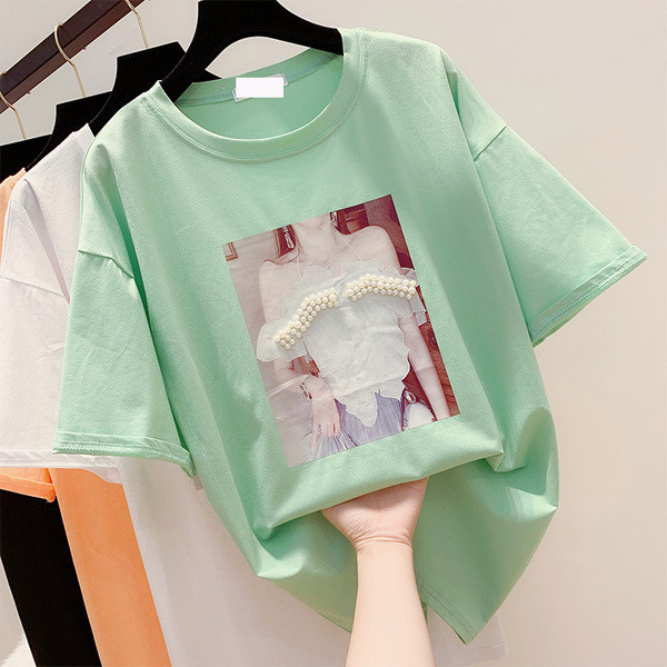 Alkalmi női póló rátéttel