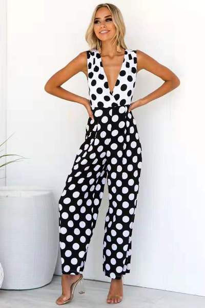 Új, modern női jumpsuit fekete-fehér pöttyökkel