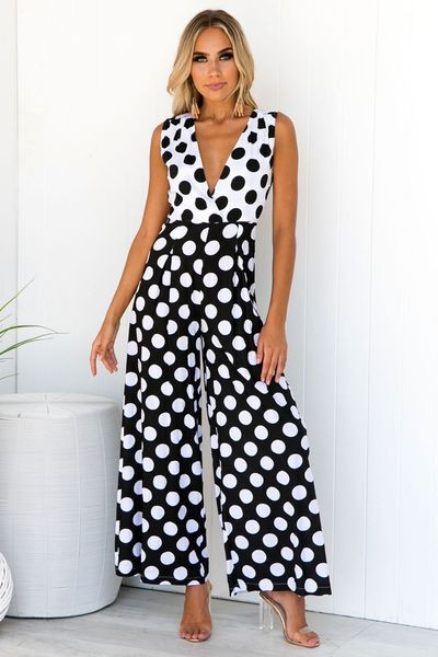 Új, modern női jumpsuit fekete-fehér pöttyökkel
