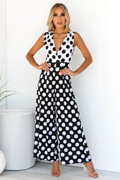Új, modern női jumpsuit fekete-fehér pöttyökkel