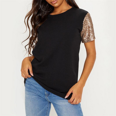 Modern női blúz, fekete-fehér flitterekkel