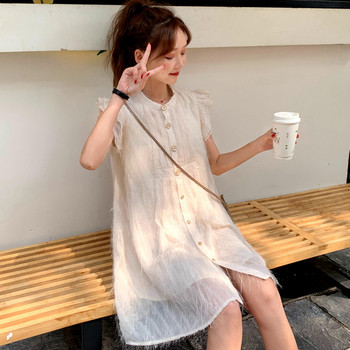 Stílusos női ruha gombokkal, bézs színben