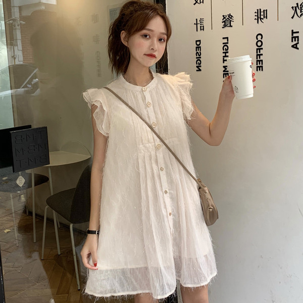 Stílusos női ruha gombokkal, bézs színben