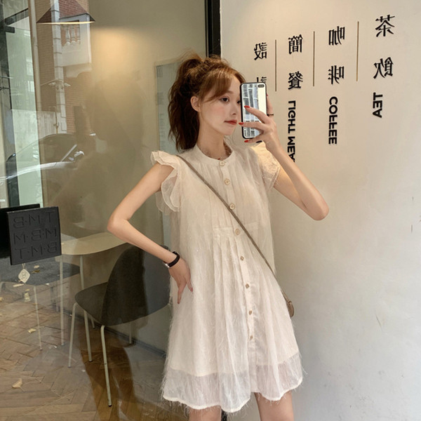 Stílusos női ruha gombokkal, bézs színben