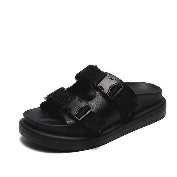 Női alkalmi papucs fekete-fehér színben