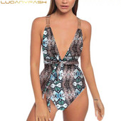 Korszerű fürdőruha V-nyakú és fém elemekkel