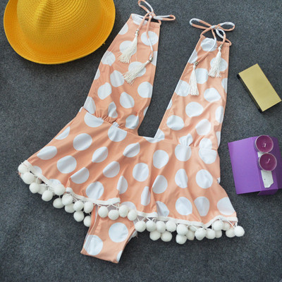 Pöttyös fürdőruha mély nyakkivágással