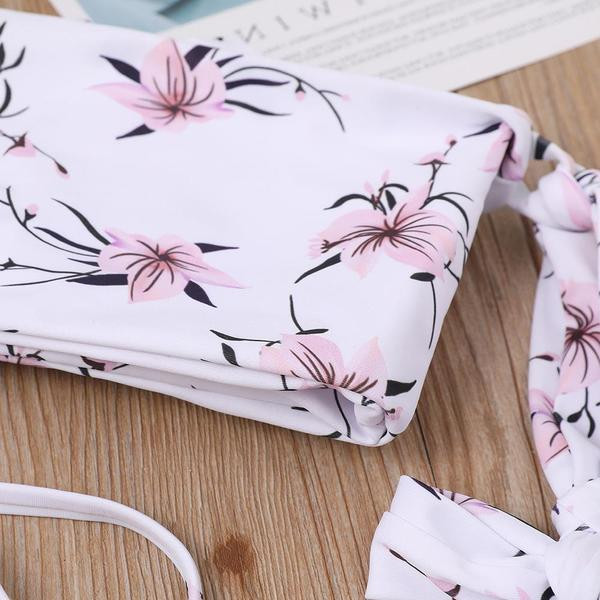 Fürdőruha szalagos felsővel és virágmintával