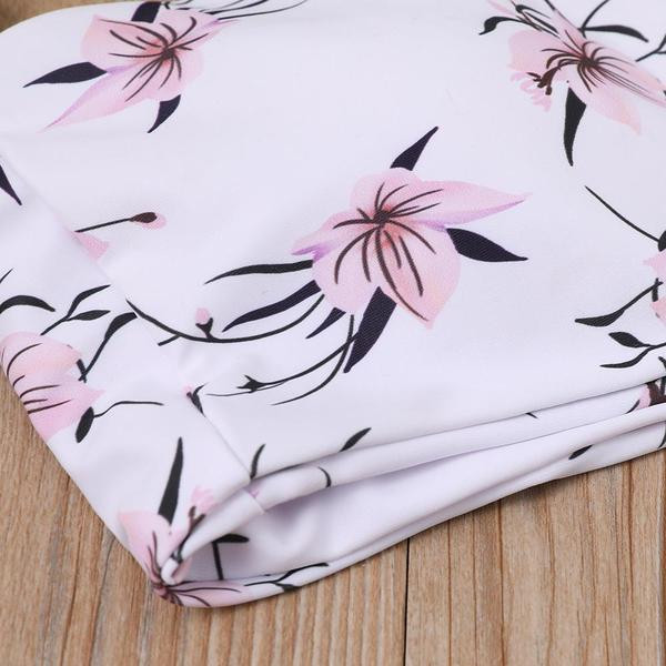 Fürdőruha szalagos felsővel és virágmintával