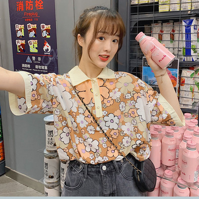 Széles női virágos blúz