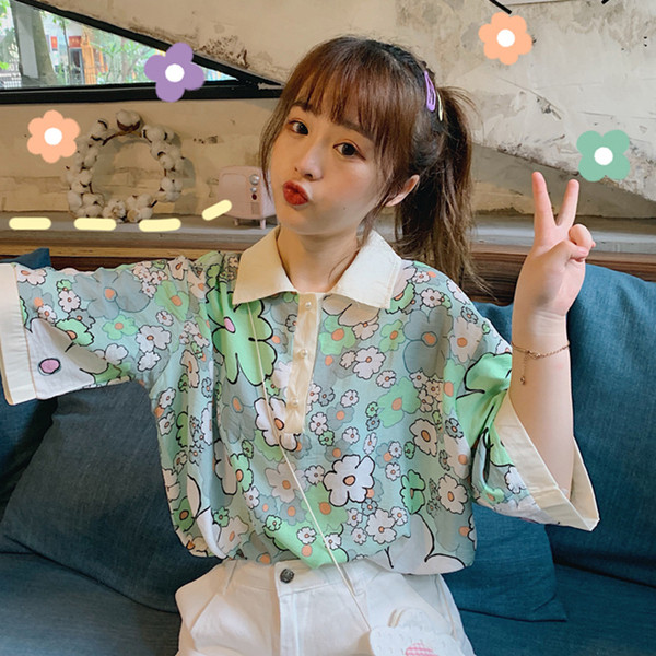 Széles női virágos blúz