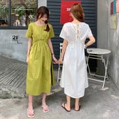 Hétköznapi női ruha, hátul nyakkendővel