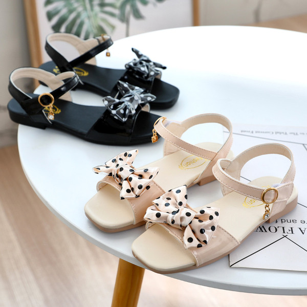 Modern gyerekszandál két színben, szalaggal