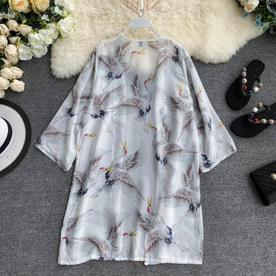 Modern női pareo fehér színben, mintával