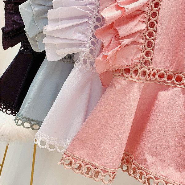 Stílusos női akasztófelső O-nyakkivágással, több színben