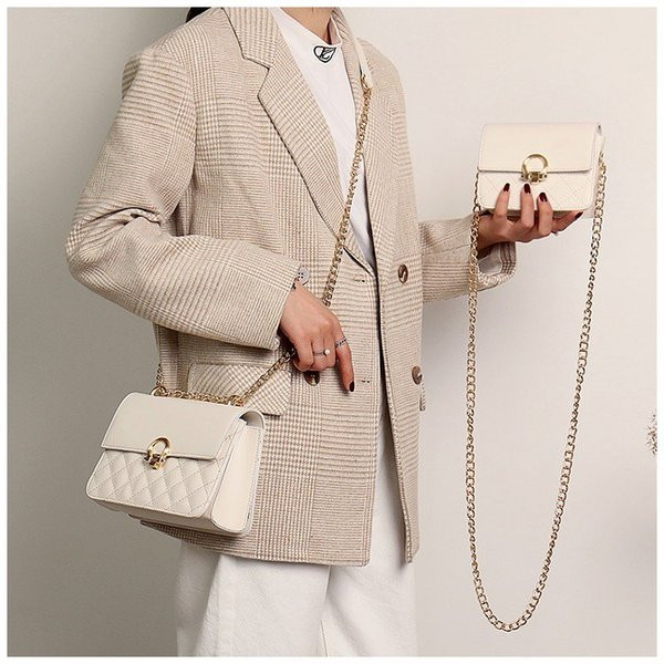 Stílusos női táska fém rögzítéssel